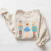 vintage christmas sweatshirt with nutcracker and sugar plum fairy design for ballet lovers and holiday celebrations usjaa