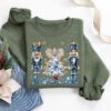 vintage christmas sweatshirt with nutcracker design and faux sequin detail for women holiday crewneck wear mroqz