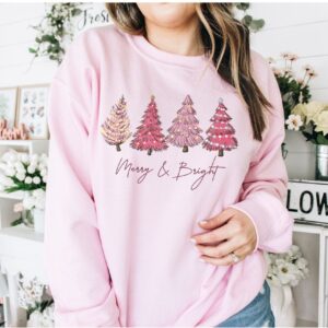 vintage christmas sweatshirt with pink christmas tree design and merry bright print for festive holiday style dau9x