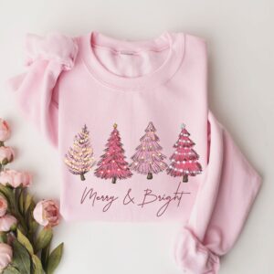 vintage christmas sweatshirt with pink christmas tree design and merry bright print for festive holiday style f2yo8