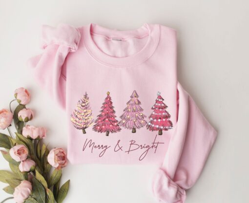 vintage christmas sweatshirt with pink christmas tree design and merry bright print for festive holiday style f2yo8