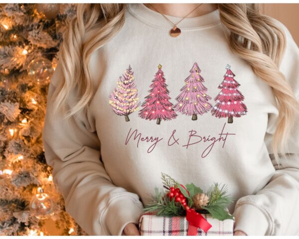 vintage christmas sweatshirt with pink christmas tree design and merry bright print for festive holiday style odq8f