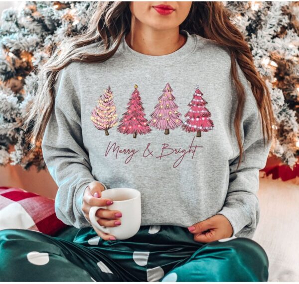 vintage christmas sweatshirt with pink christmas tree design and merry bright print for festive holiday style ro9qq