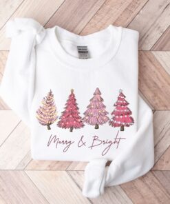 vintage christmas sweatshirt with pink christmas tree design and merry bright print for festive holiday style wzegz