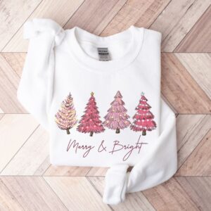 vintage christmas sweatshirt with pink christmas tree design and merry bright print for festive holiday style wzegz