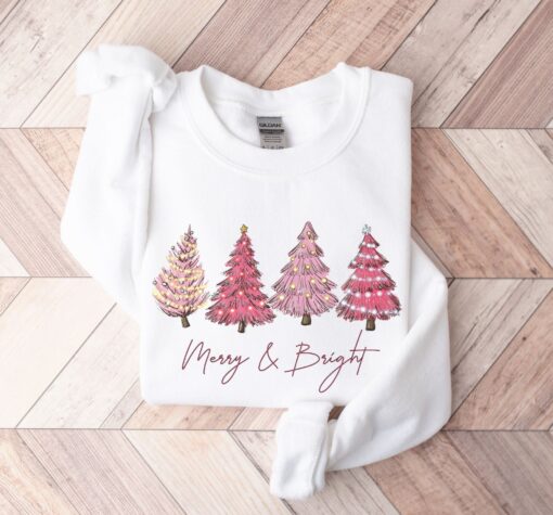 vintage christmas sweatshirt with pink christmas tree design and merry bright print for festive holiday style wzegz