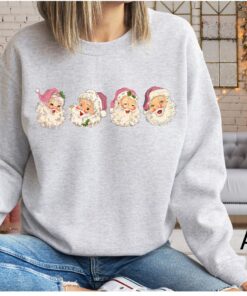 vintage christmas sweatshirt with pink santa claus design and retro style for a unique holiday look nvepz