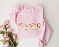 Vintage Christmas Sweatshirt with Pink Santa Claus Design and Retro Style for a Unique Holiday Look