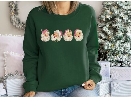 vintage christmas sweatshirt with pink santa claus design and retro style for a unique holiday look opfjr