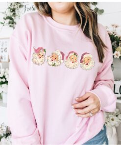 vintage christmas sweatshirt with pink santa claus design and retro style for a unique holiday look tqcr6