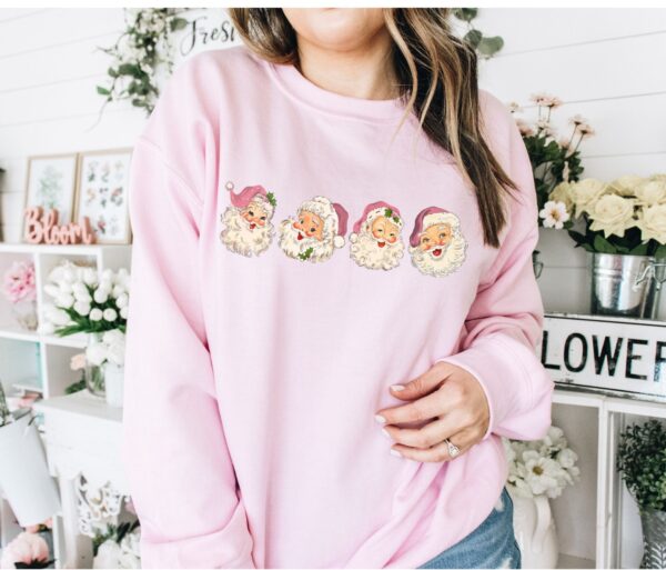 vintage christmas sweatshirt with pink santa claus design and retro style for a unique holiday look tqcr6