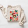 vintage christmas sweatshirt with reindeer antlers design for unisex holiday wear hybdr