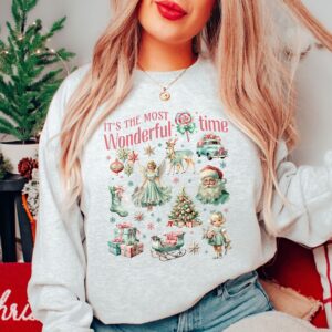 vintage christmas sweatshirt with retro pink design and fun doodle print for winter wear h1fpl