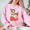 vintage christmas sweatshirt with retro reindeer design in pink cute baby deer shirt for holiday celebrations and festive gatherings cvgel