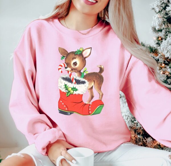 vintage christmas sweatshirt with retro reindeer design in pink cute baby deer shirt for holiday celebrations and festive gatherings cvgel