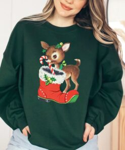 vintage christmas sweatshirt with retro reindeer design in pink cute baby deer shirt for holiday celebrations and festive gatherings fsd7h