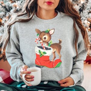 vintage christmas sweatshirt with retro reindeer design in pink cute baby deer shirt for holiday celebrations and festive gatherings u5nx0 scaled