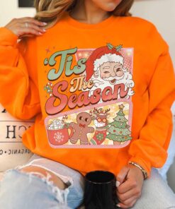 vintage christmas sweatshirt with retro santa claus design and hot cocoa graphic for a fun winter look pejot