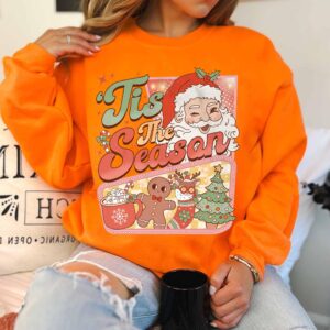 vintage christmas sweatshirt with retro santa claus design and hot cocoa graphic for a fun winter look pejot