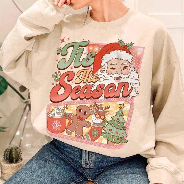 vintage christmas sweatshirt with retro santa claus design and hot cocoa graphic for a fun winter look v0z2s