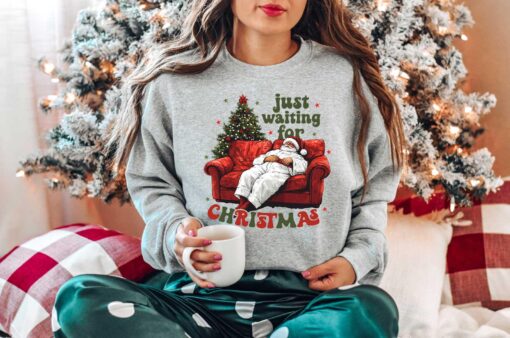 vintage christmas sweatshirt with santa design for family gatherings and holiday celebrations in comfortable pullover style