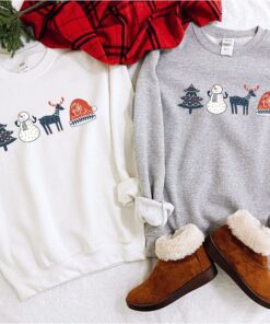 vintage christmas sweatshirt with scandinavian doodles and nordic folk art reindeer design for a unique holiday style 0af2g