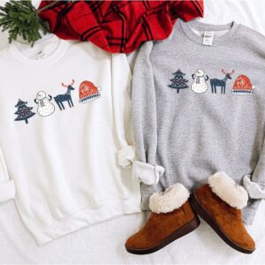 vintage christmas sweatshirt with scandinavian doodles and nordic folk art reindeer design for a unique holiday style 0af2g