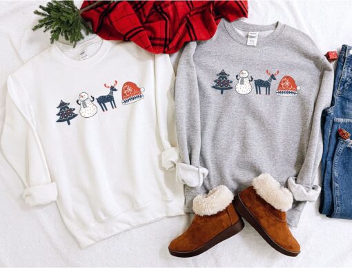 vintage christmas sweatshirt with scandinavian doodles and nordic folk art reindeer design for a unique holiday style 0af2g