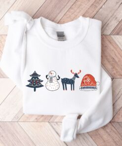 vintage christmas sweatshirt with scandinavian doodles and nordic folk art reindeer design for a unique holiday style 0rkec