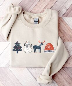 vintage christmas sweatshirt with scandinavian doodles and nordic folk art reindeer design for a unique holiday style ww2wv