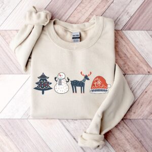 vintage christmas sweatshirt with scandinavian doodles and nordic folk art reindeer design for a unique holiday style ww2wv