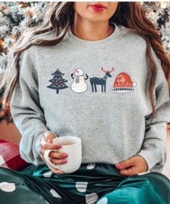 vintage christmas sweatshirt with scandinavian doodles and nordic folk art reindeer design for a unique holiday style yodsh