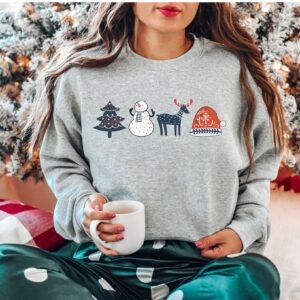 vintage christmas sweatshirt with scandinavian doodles and nordic folk art reindeer design for a unique holiday style yodsh