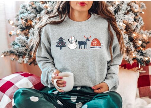 vintage christmas sweatshirt with scandinavian doodles and nordic folk art reindeer design for a unique holiday style yodsh