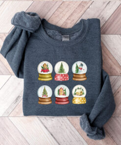 vintage christmas sweatshirt with snowglobe design for women comfortable crewneck style for holiday celebrations and festive outfits ipmtw scaled