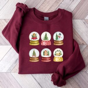 vintage christmas sweatshirt with snowglobe design for women comfortable crewneck style for holiday celebrations and festive outfits qztcw