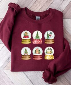 vintage christmas sweatshirt with snowglobe design for women comfortable crewneck style for holiday celebrations and festive outfits qztcw scaled