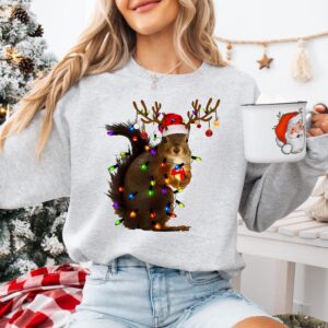 vintage christmas sweatshirt with squirrel design and santa hat tee for festive holiday style raddq