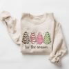 vintage christmas sweatshirt with tree cake design for holiday celebrations and festive gatherings ddtjp