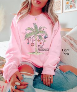 vintage christmas sweatshirt with tropical palm tree design for beach vacation and family gatherings mele kalikimaka theme gxhqd