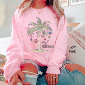 vintage christmas sweatshirt with tropical palm tree design for beach vacation and family gatherings mele kalikimaka theme gxhqd