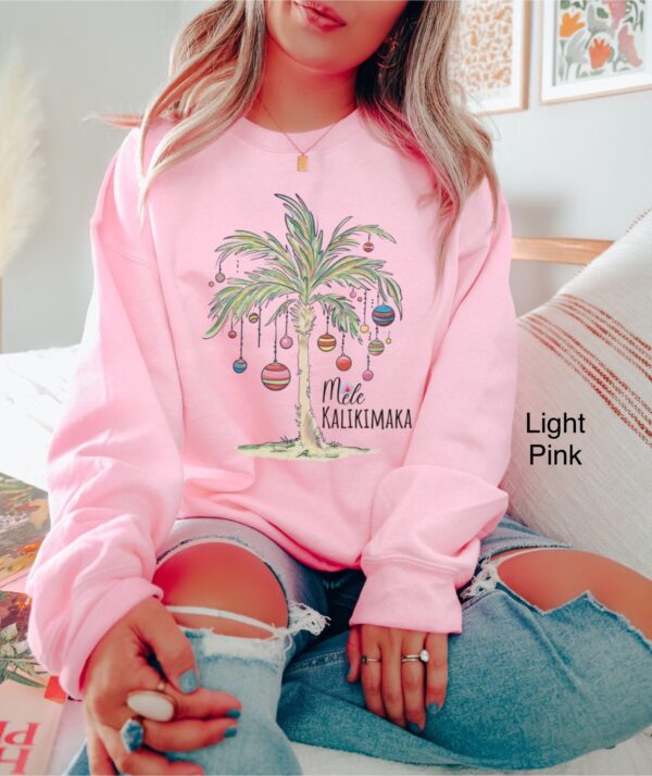 vintage christmas sweatshirt with tropical palm tree design for beach vacation and family gatherings mele kalikimaka theme