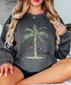 vintage christmas sweatshirt with tropical palm tree design for beach vacation and family gatherings mele kalikimaka theme qmcas