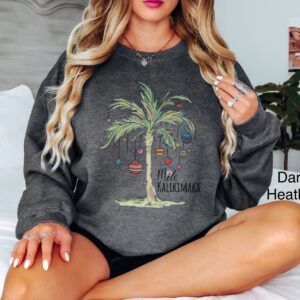 vintage christmas sweatshirt with tropical palm tree design for beach vacation and family gatherings mele kalikimaka theme qmcas