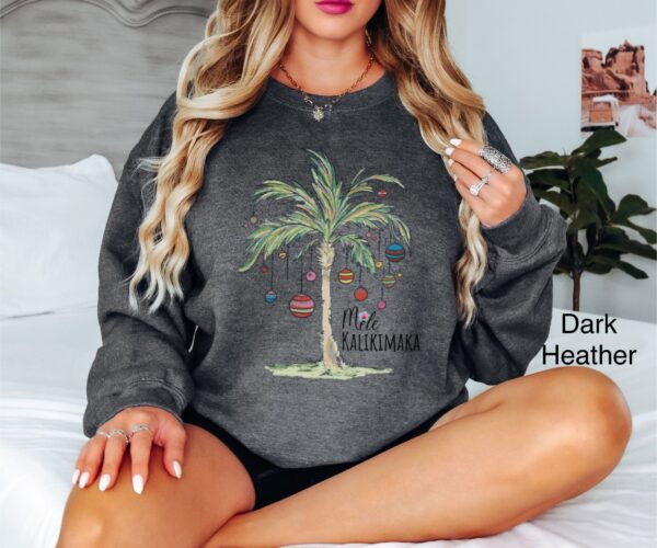 vintage christmas sweatshirt with tropical palm tree design for beach vacation and family gatherings mele kalikimaka theme qmcas