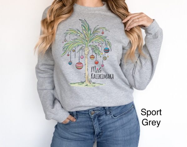 vintage christmas sweatshirt with tropical palm tree design for beach vacation and family gatherings mele kalikimaka theme