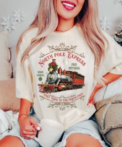 vintage christmas t shirt featuring north pole express train design retro style for holiday celebrations and festive gatherings owaq2 scaled