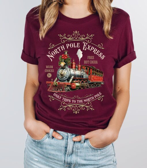 vintage christmas t shirt featuring north pole express train design retro style for holiday celebrations and festive gatherings tftgw