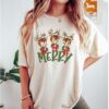 vintage christmas t shirt featuring retro reindeer design for holiday parties and gatherings vofk0