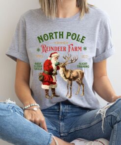 vintage christmas t shirt featuring retro santa and reindeer design for a fun holiday look at the north pole b5pxq scaled